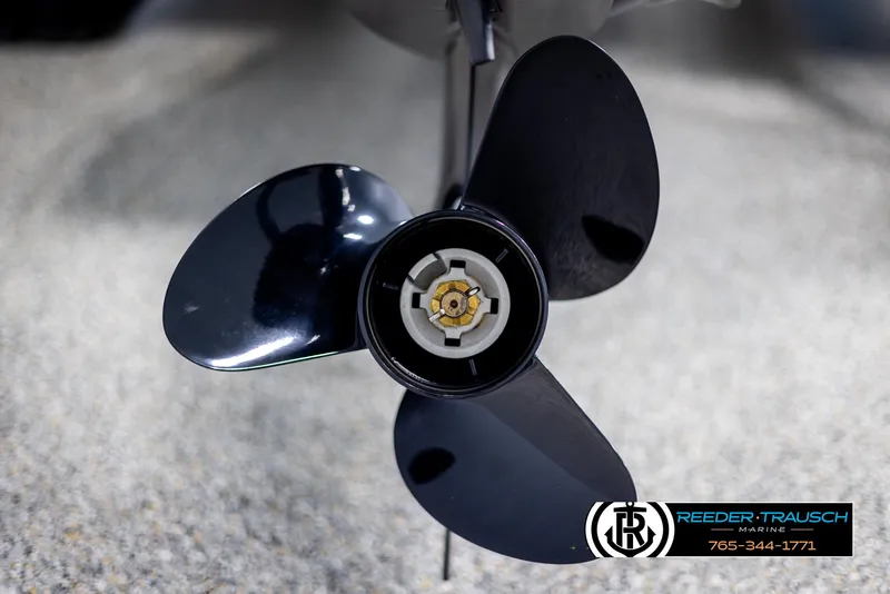 Slide: The Image of Close-up of a 2025 Tahoe SP Cr boat propeller on a textured surface. - 45