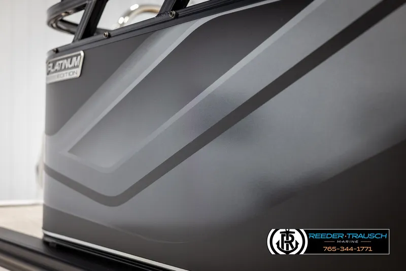 Slide: The Image of Close-up of 2025 Tahoe SP Cr boat with sleek gray design and "Platinum Edition" badge. - 49