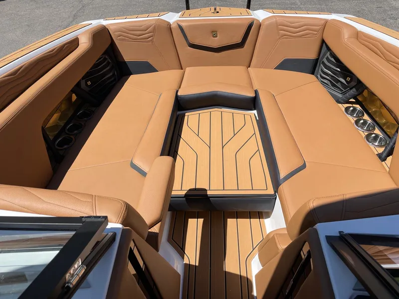 Slide: The Image of Luxurious interior of 2025 Nautique Super Air Nautique G25 boat. - 11