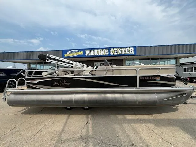 Slide: The Image of 2012 SunChaser 8522 C-N-F pontoon boat at a marine center. - 10