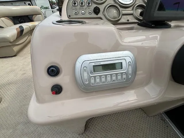 Slide: The Image of Dashboard of 2012 SunChaser 8522 C-N-F boat with marine stereo system. - 27