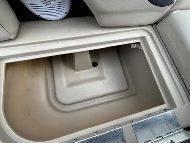 Slide: The Image of Storage compartment in 2012 SunChaser 8522 C-N-F boat, beige interior. - 33