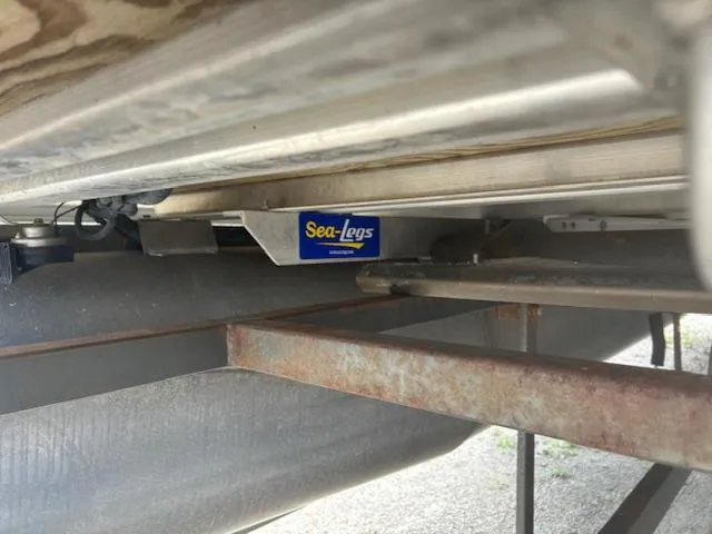 Slide: The Image of Sea-Legs system on 2012 SunChaser 8522 C-N-F pontoon boat underside. - 4