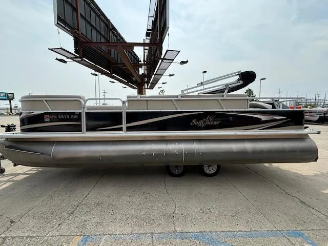 Slide: The Image of 2012 SunChaser 8522 C-N-F pontoon boat parked on concrete lot. - 7