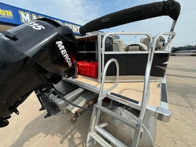 Slide: The Image of 2012 SunChaser 8522 C-N-F pontoon boat with Mercury outboard motor and ladder. - 9