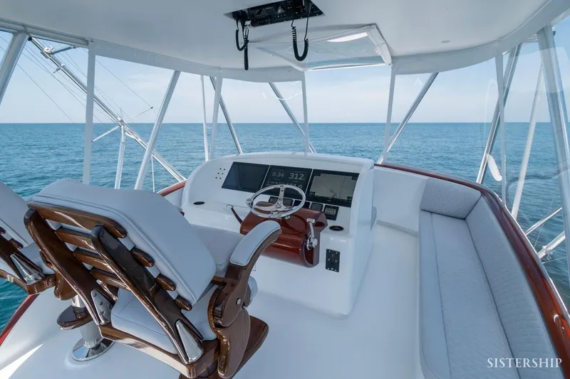 Slide: The Image of 2025 Maverick Yachts Costa Rica 45 Sportfish helm with ocean view and luxury seating. - 7