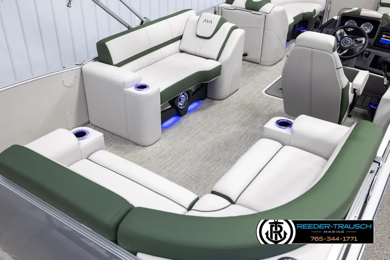 Slide: The Image of Luxurious 2025 Avalon Catalina EL pontoon boat interior with plush seating and LED lighting. - 12