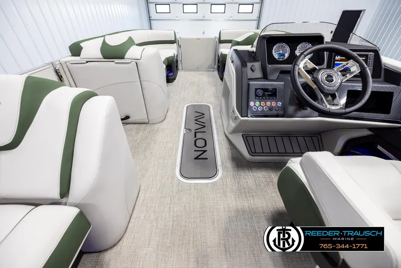 Slide: The Image of 2025 Avalon Catalina EL boat interior with modern dashboard and seating. - 18