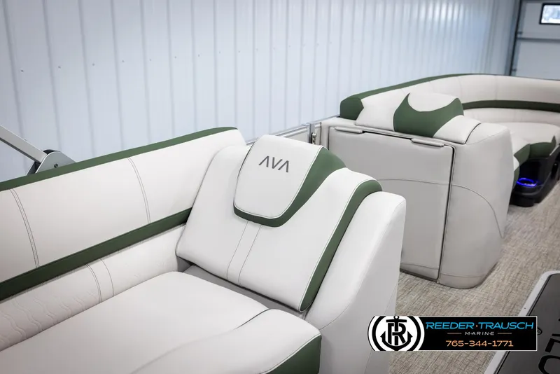 Slide: The Image of Luxurious 2025 Avalon Catalina EL boat interior with white and green seating. - 23