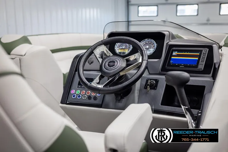 Slide: The Image of 2025 Avalon Catalina EL boat dashboard with modern controls and steering wheel. - 25