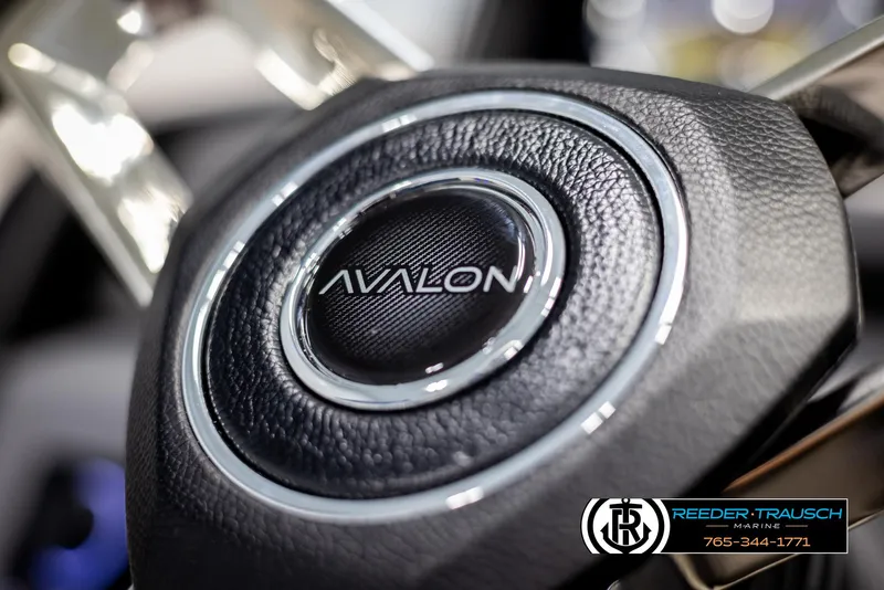 Slide: The Image of Close-up of 2025 Avalon Catalina EL steering wheel with logo. - 27