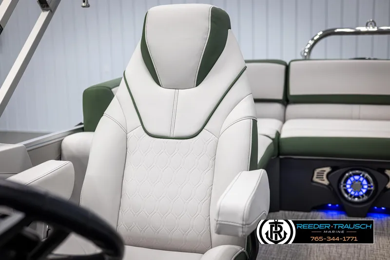 Slide: The Image of 2025 Avalon Catalina EL boat interior with luxurious white and green seating. - 31