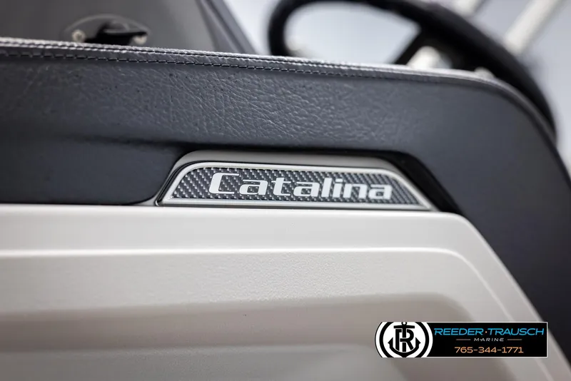 Slide: The Image of 2025 Avalon Catalina EL dashboard detail with logo and branding. - 36