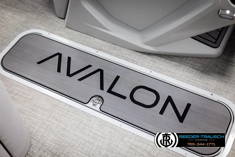 Slide: The Image of Avalon Catalina EL 2025 boat interior with branded flooring and Reeder-Trausch Marine logo. - 37