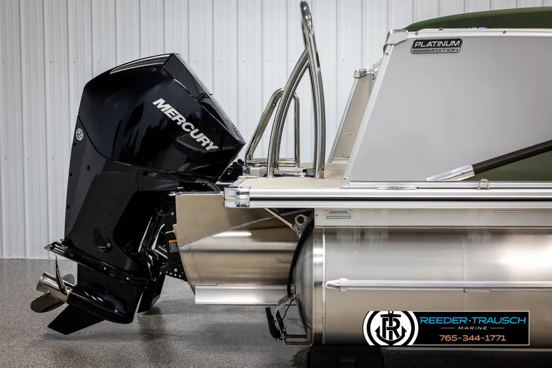 Slide: The Image of 2025 Avalon Catalina EL pontoon boat with Mercury outboard motor, side view. - 38