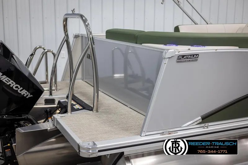 Slide: The Image of 2025 Avalon Catalina EL boat with Mercury engine and Reeder-Trausch Marine branding. - 42