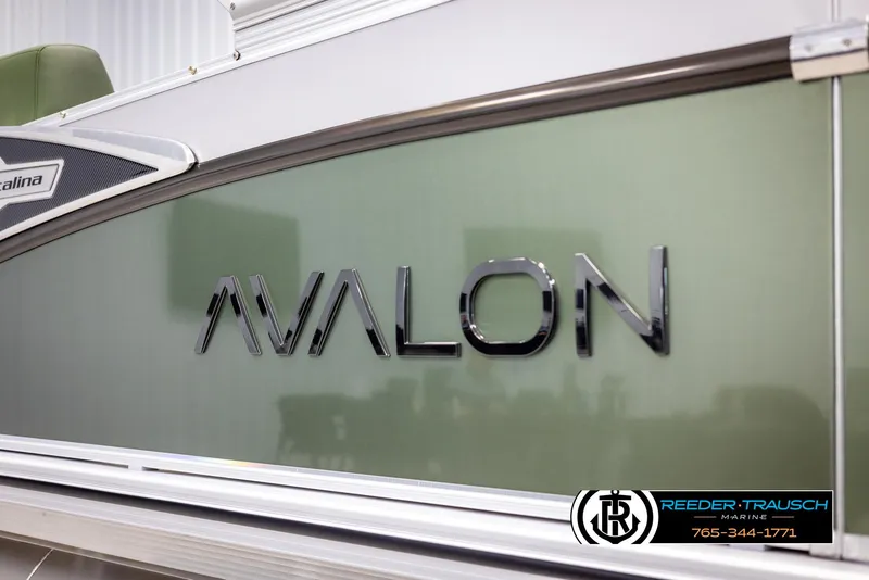 Slide: The Image of 2025 Avalon Catalina EL boat with sleek design and logo. - 44