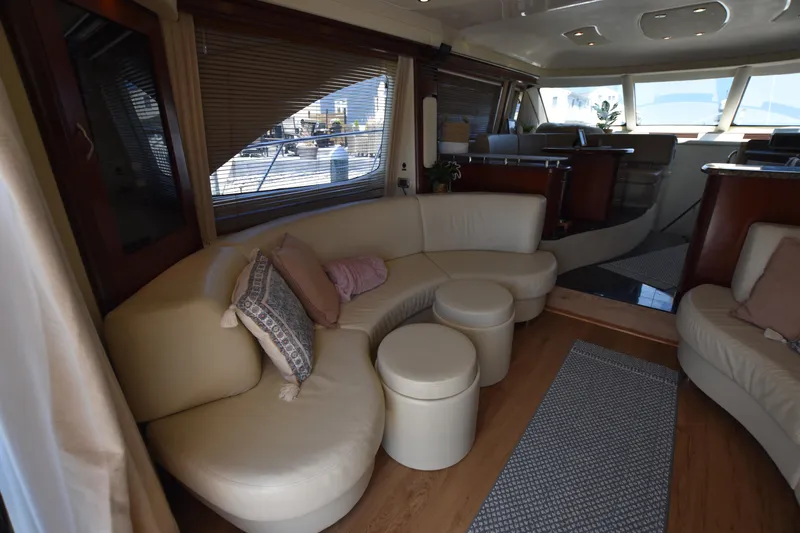 Slide: The Image of Luxurious 2006 Sea Ray 58 Sedan Bridge interior with elegant seating and modern design. - 32
