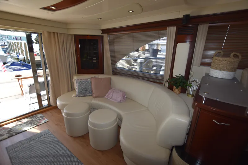 Slide: The Image of Luxurious 2006 Sea Ray 58 Sedan Bridge interior with plush seating and elegant decor. - 44
