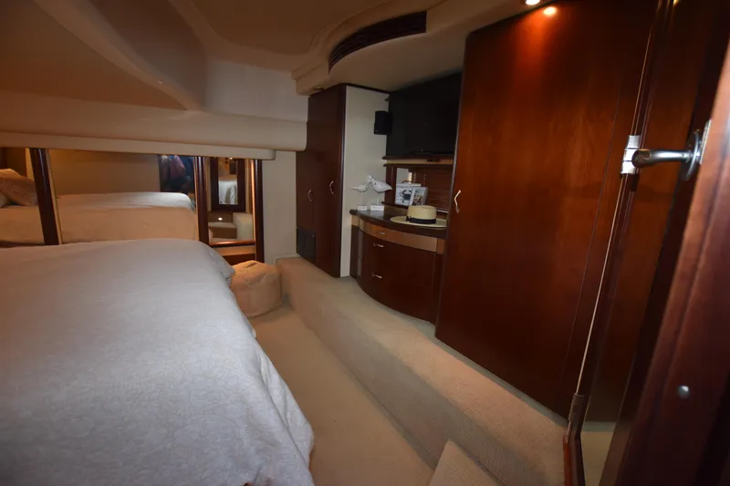 Slide: The Image of Luxurious interior of 2006 Sea Ray 58 Sedan Bridge yacht bedroom. - 47