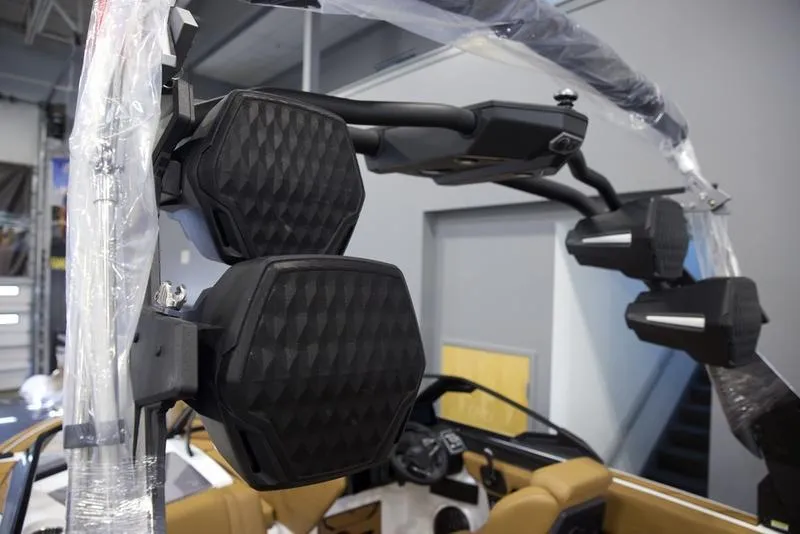 Slide: The Image of 2025 Malibu 23 LSV boat interior with advanced speaker system. - 11