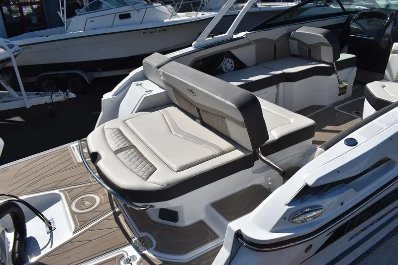 Slide: The Image of 2023 Monterey 255SS boat interior with luxurious seating and modern design. - 16