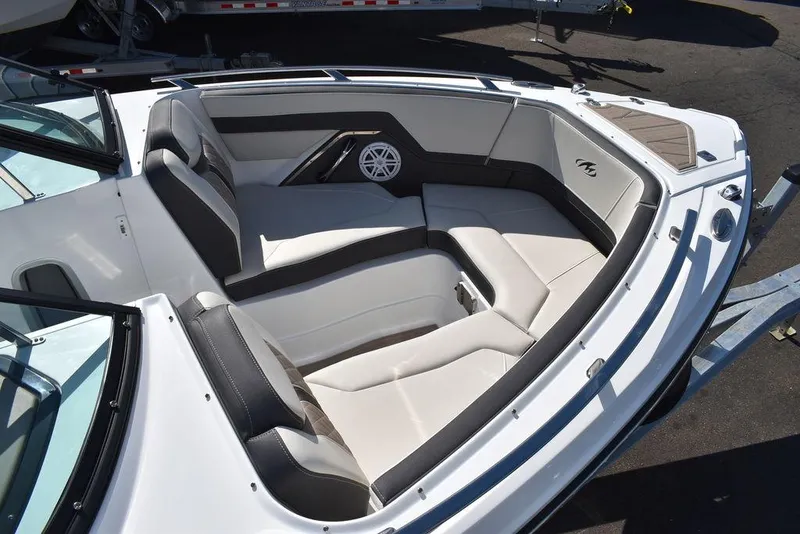 Slide: The Image of 2023 Monterey 255SS boat interior with sleek seating and modern design. - 18
