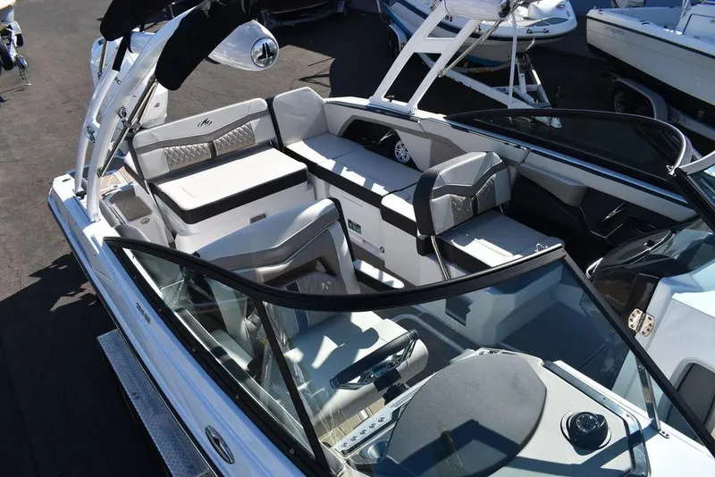 Slide: The Image of 2023 Monterey 255SS boat interior with sleek seating and modern design. - 19