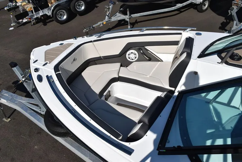Slide: The Image of 2023 Monterey 255SS boat interior with sleek seating and modern design. - 20