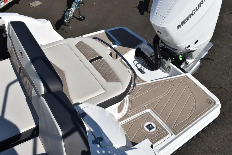 Slide: The Image of 2023 Monterey 255SS boat with Mercury engine, featuring sleek seating and deck design. - 24