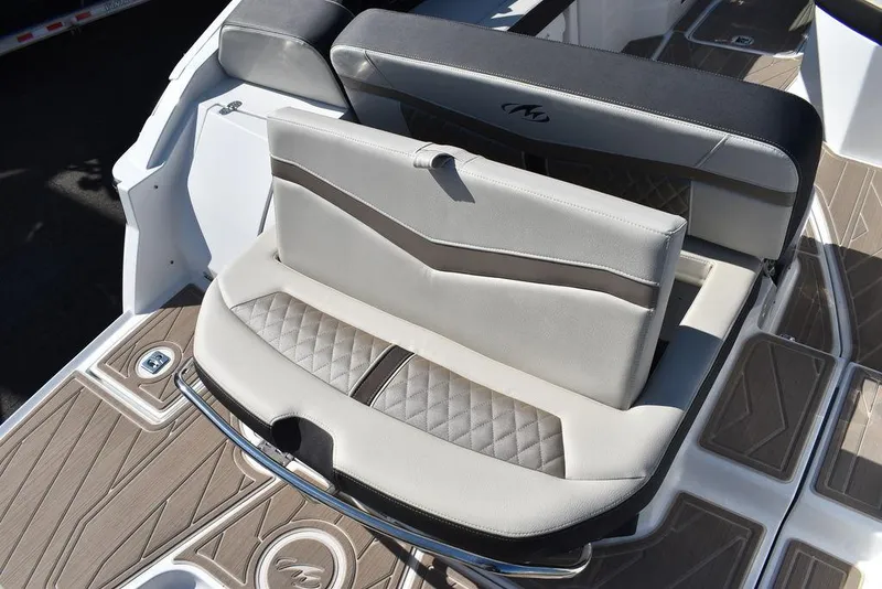 Slide: The Image of 2023 Monterey 255SS boat seating with elegant gray upholstery and diamond stitching. - 32