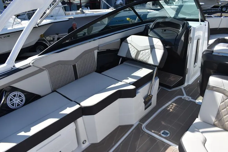 Slide: The Image of 2023 Monterey 255SS boat interior with sleek seating and modern design. - 38