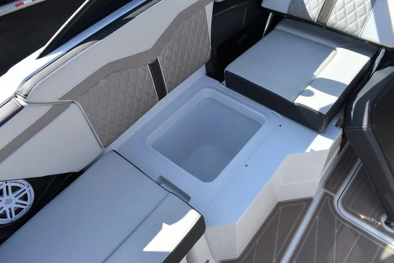 Slide: The Image of 2023 Monterey 255SS boat interior with seating and storage compartment. - 39