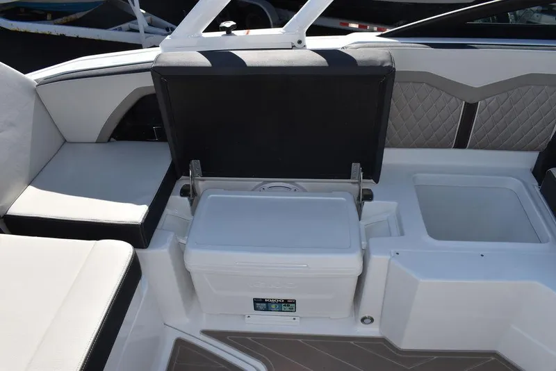 Slide: The Image of 2023 Monterey 255SS boat interior with seating and storage compartments. - 40