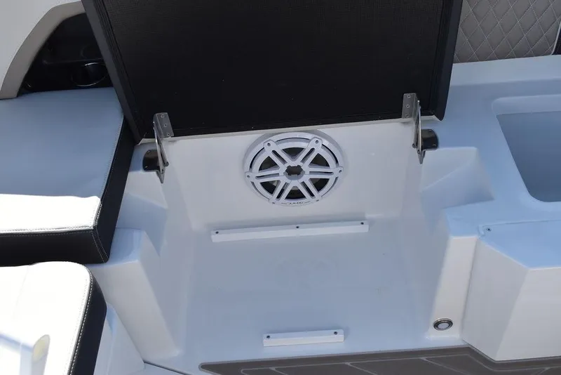 Slide: The Image of 2023 Monterey 255SS boat interior with speaker and seating area. - 41