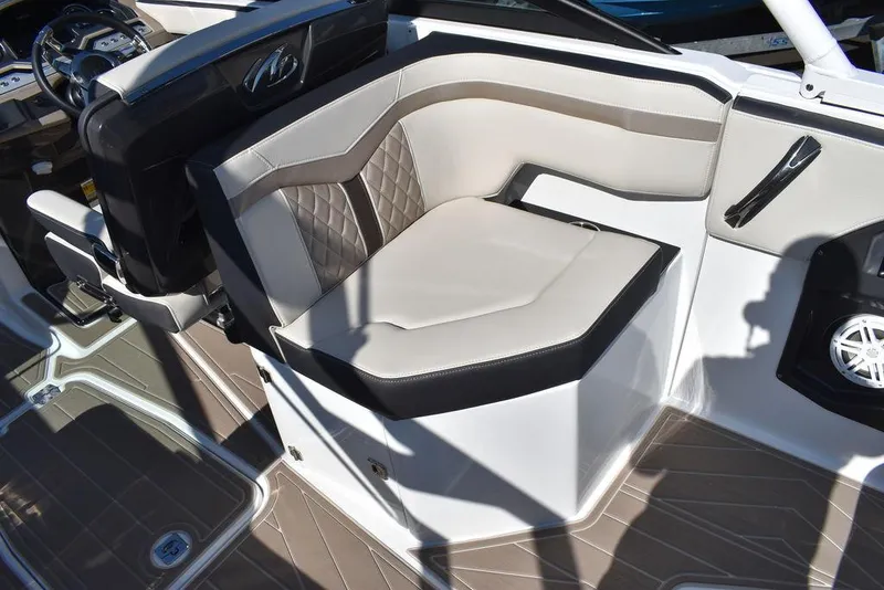 Slide: The Image of 2023 Monterey 255SS boat interior with cushioned seating and modern design. - 43