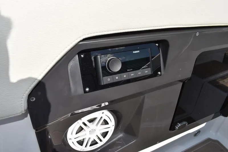 Slide: The Image of 2023 Monterey 255SS boat audio system with speaker and control panel. - 47