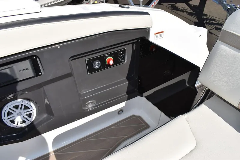 Slide: The Image of 2023 Monterey 255SS boat interior with control panel and speaker. - 48
