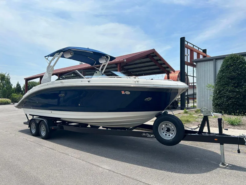 Slide: The Image of 2019 Sea Ray 270 SDX boat on trailer, parked outdoors. - 3