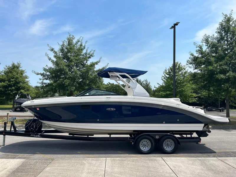 Slide: The Image of 2019 Sea Ray 270 SDX boat on trailer, parked outdoors. - 4