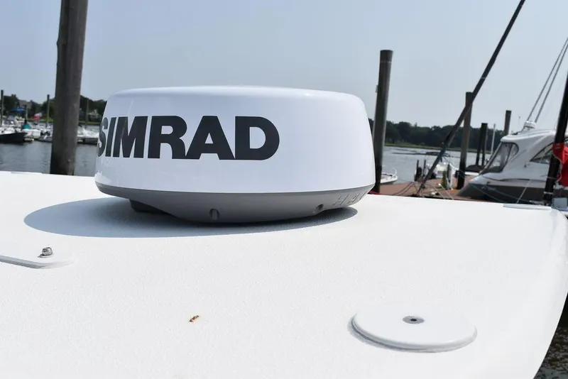 Slide: The Image of Simrad radar on 2015 Steiger Craft 255 Center Console boat deck. - 12