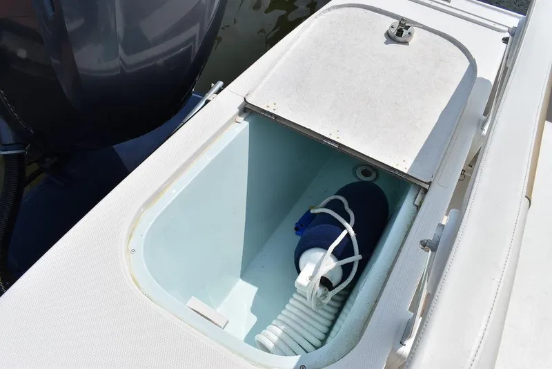 Slide: The Image of Storage compartment on 2015 Steiger Craft 255 Center Console boat. - 18
