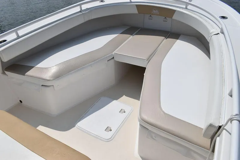 Slide: The Image of 2015 Steiger Craft 255 Center Console boat interior with cushioned seating. - 42