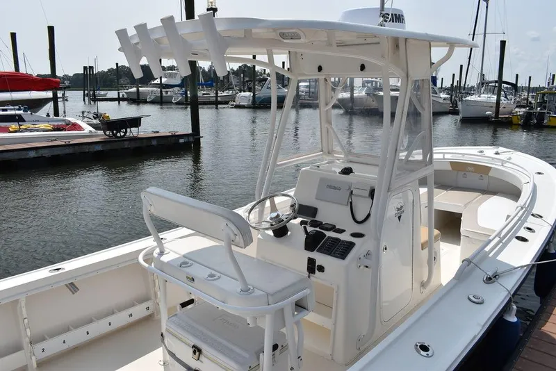 Slide: The Image of 2015 Steiger Craft 255 Center Console boat docked at marina. - 7