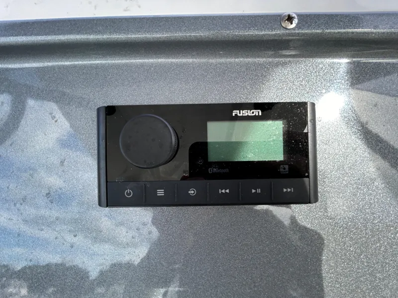 Slide: The Image of Fusion audio system on 2025 Grand Inflatables G850 boat dashboard. - 15