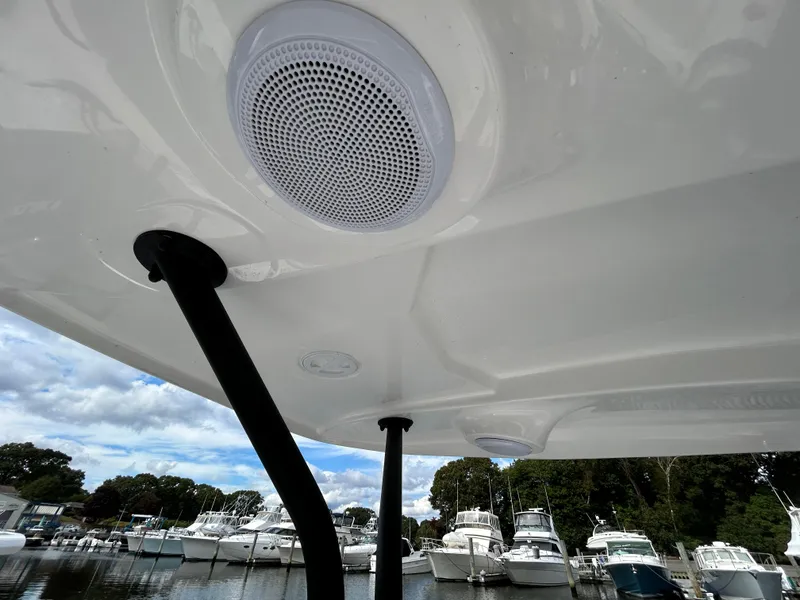 Slide: The Image of 2025 Grand Inflatables G850 boat with speaker system, docked at marina. - 20
