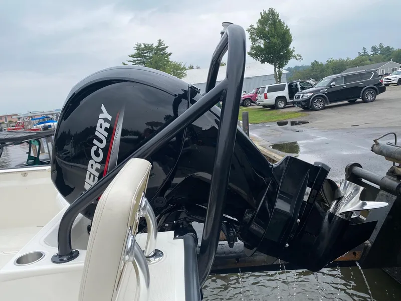 Slide: The Image of 2023 Boston Whaler 190 Montauk with Mercury outboard motor at a dock. - 15