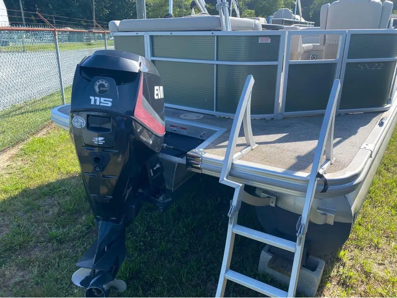 Slide: The Image of 2017 Bennington 22 SLX pontoon boat with Evinrude 115 outboard motor and boarding ladder. - 4