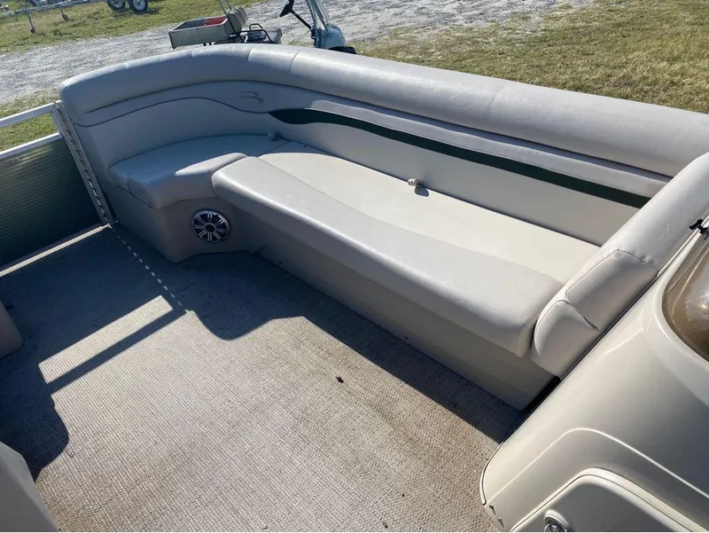 Slide: The Image of 2017 Bennington 22 SLX boat interior with spacious seating and speaker system. - 9