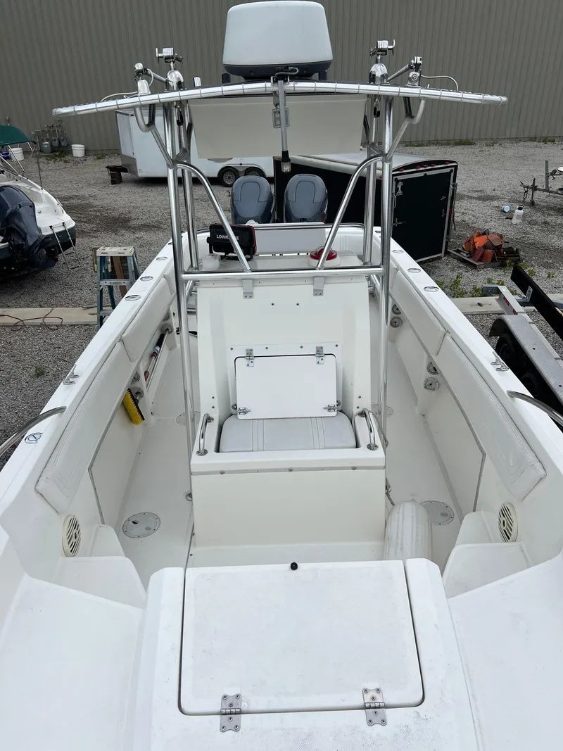 Slide: The Image of 1998 Fountain 31 CC boat interior with center console and seating. - 13